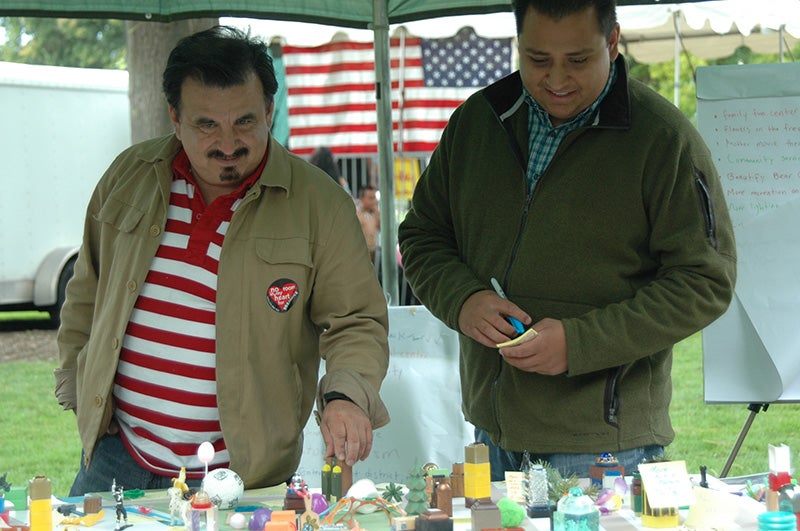 Gerardo Sandoval and James Rojas at the Greater Medford Cultural Fair