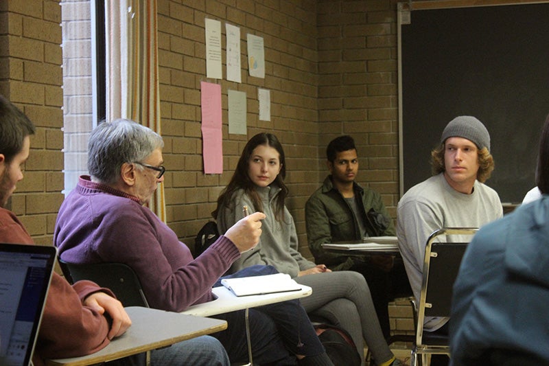 "I wouldn't be a teacher if I weren't optimistic about the future," says architecture Professor Howard Davis (left) in the first week of the class.