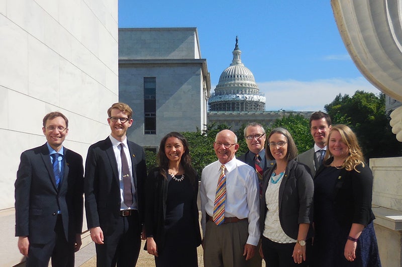 From left, Mugs Scherer, Rory Isbell, Ali Lau, Rep. Peter DeFazio, Robert Parker, Krista Dillon, Bentley Regher, and Amy Nelms