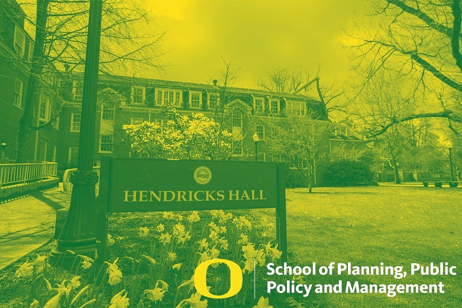 Duotone green and yellow photograph of the exterior of the historic Hendricks Hall. 