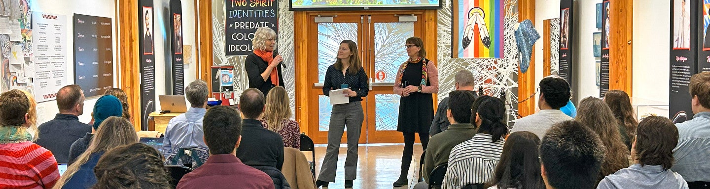 Photograph of faculty at fall presentations. 