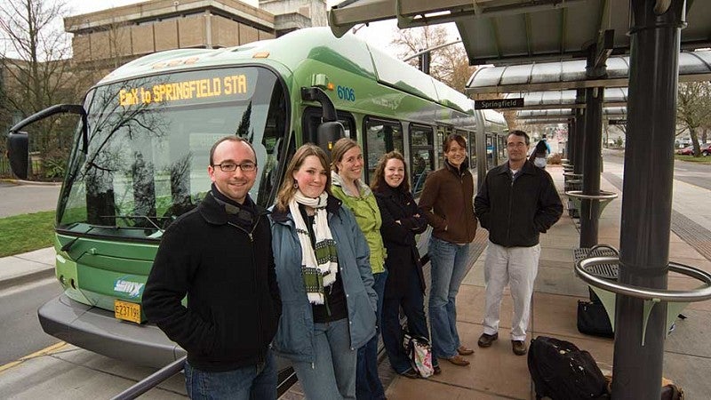 Students in front of the EmX bus