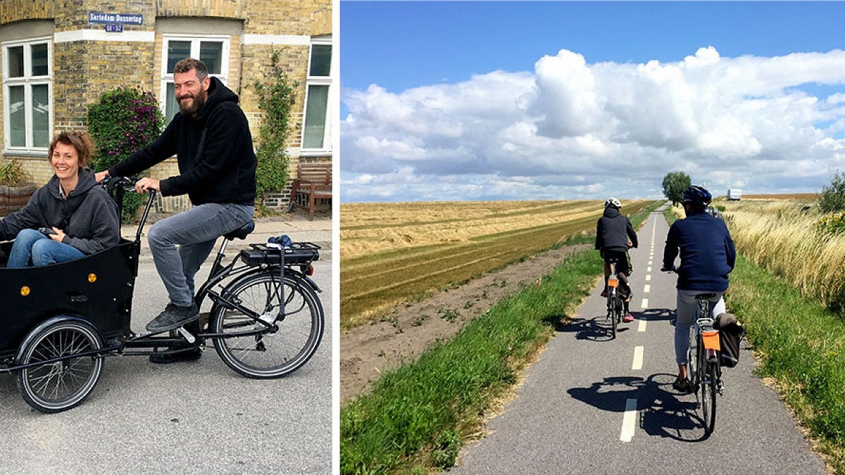 Three people with a dog and a bike outside; People biking through countryside