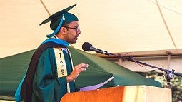 Photo of Agraj Dangal speaking at commencement