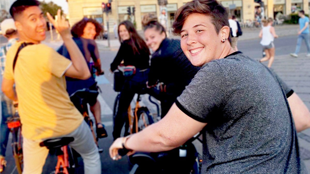 Finley Heeb and other students on bikes in Europe