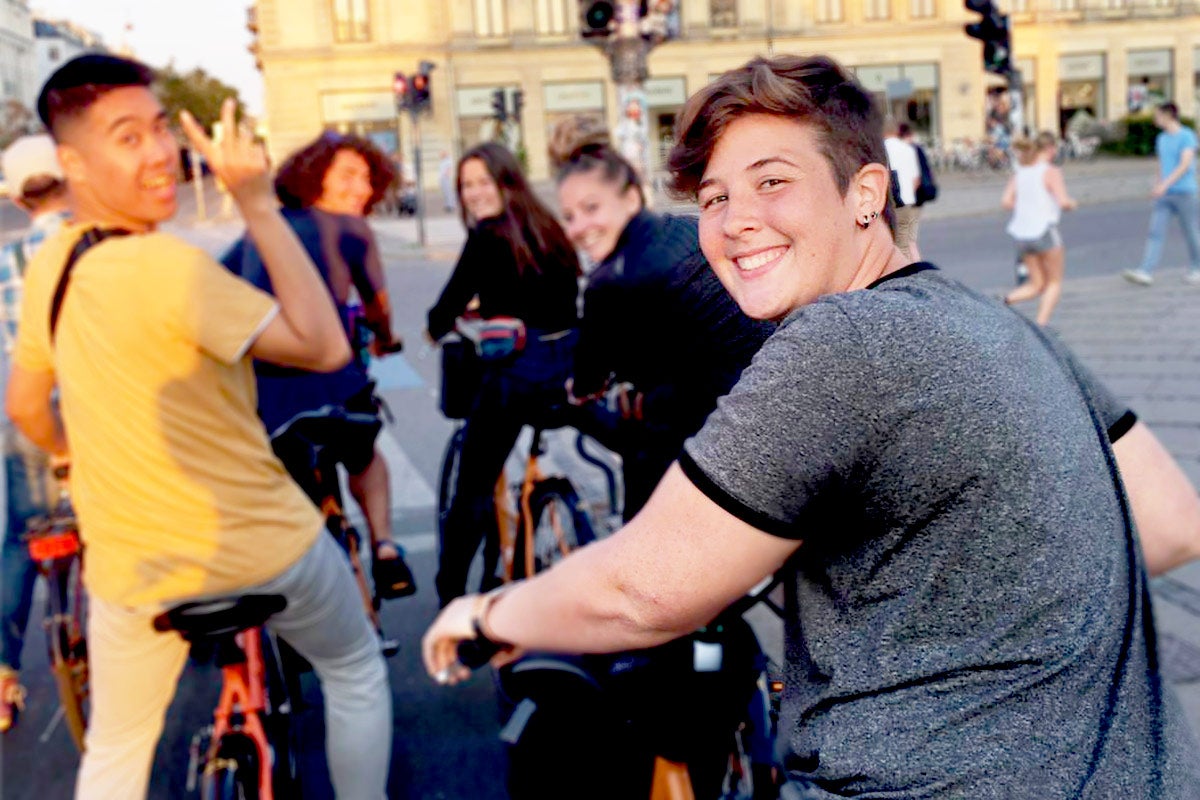 Finley Heeb and other students on bikes in Europe